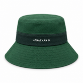 Green Jonathan D bucket hat on a white background