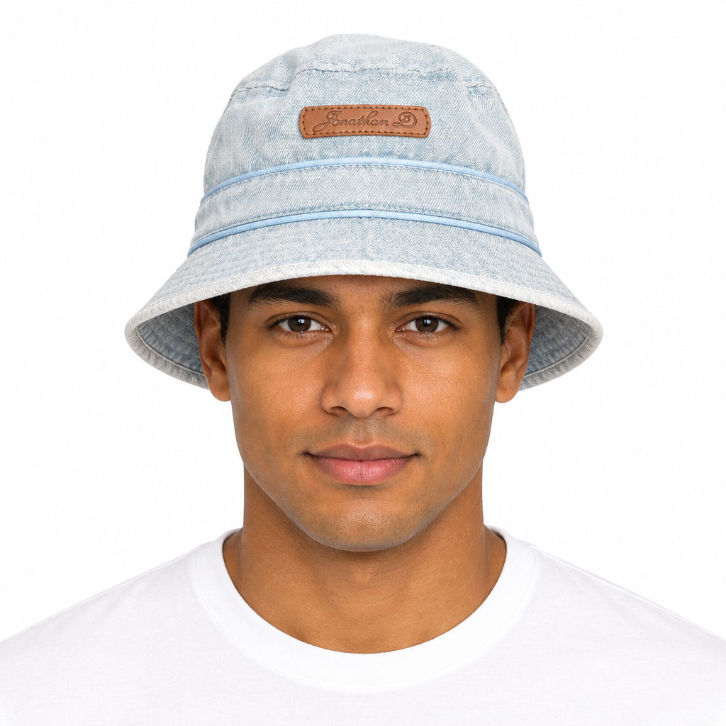 Model wearing Jonathan D bucket hat light denim side on white background