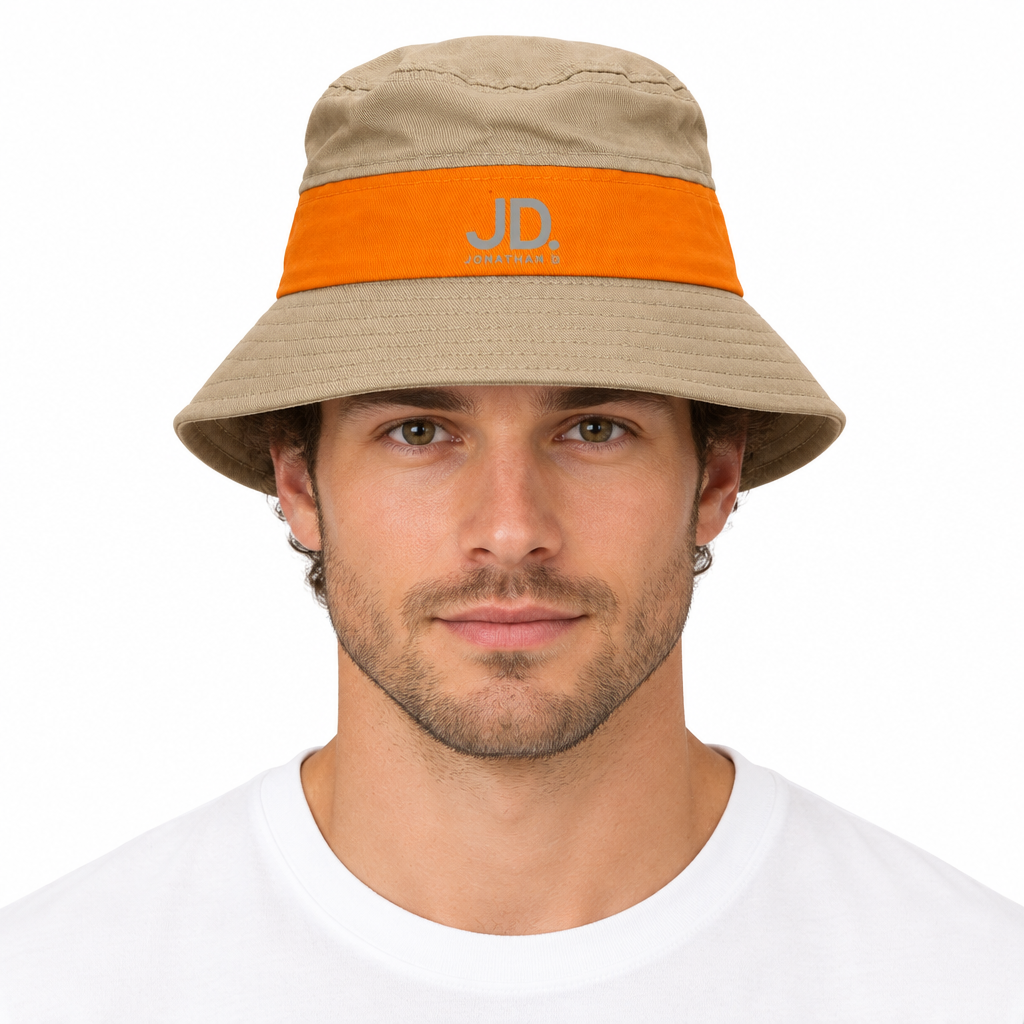 Male model wearing the Jonathan D stone and orange bucket hat against a white studio background