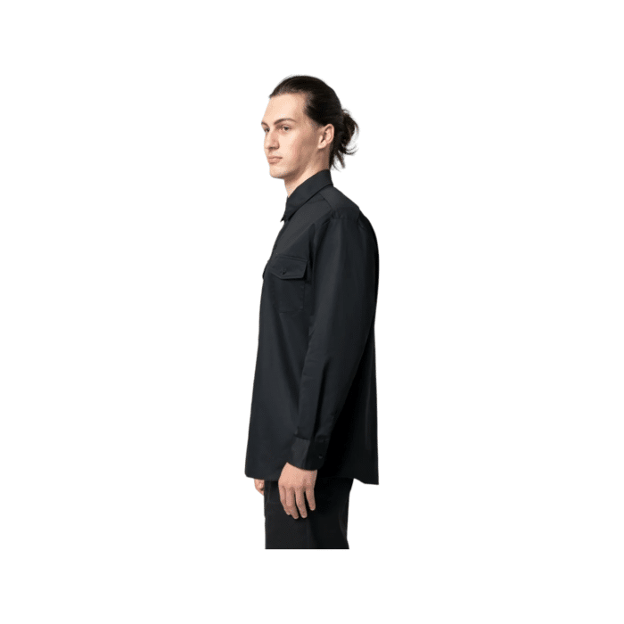 95 1B 1 | The Dickies Shirt 847 Long Sleeve in Black is a durable, comfortable work shirt made from a blend of polyester and cotton, featuring moisture-wicking properties, a relaxed fit, and twin chest pockets for functionality and style.