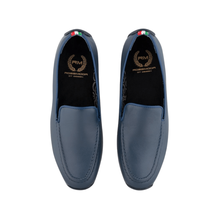 137 81B | The Rossimoda Slip On Leather in Navy combines luxurious suede with a sleek, effortless design for ultimate comfort and style. Perfect for any occasion, these slip-ons offer a sophisticated touch to both casual and formal outfits.