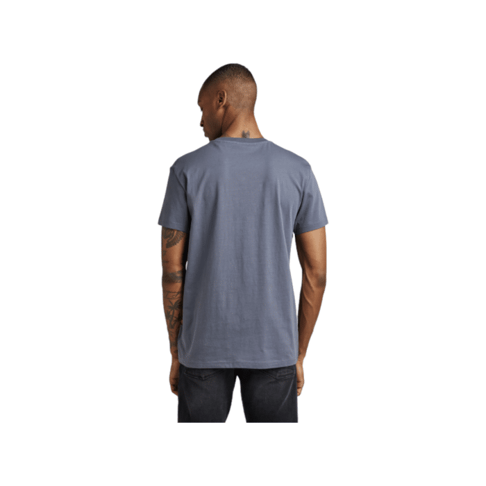 807 53B | The G Star Crew Graphic 8 R T in Blue Colour boasts a striking graphic on the front, providing a modern touch to its timeless crew neck style. Made from high-quality cotton, this T-shirt offers excellent comfort and durability, perfect for both casual and stylish everyday wear.