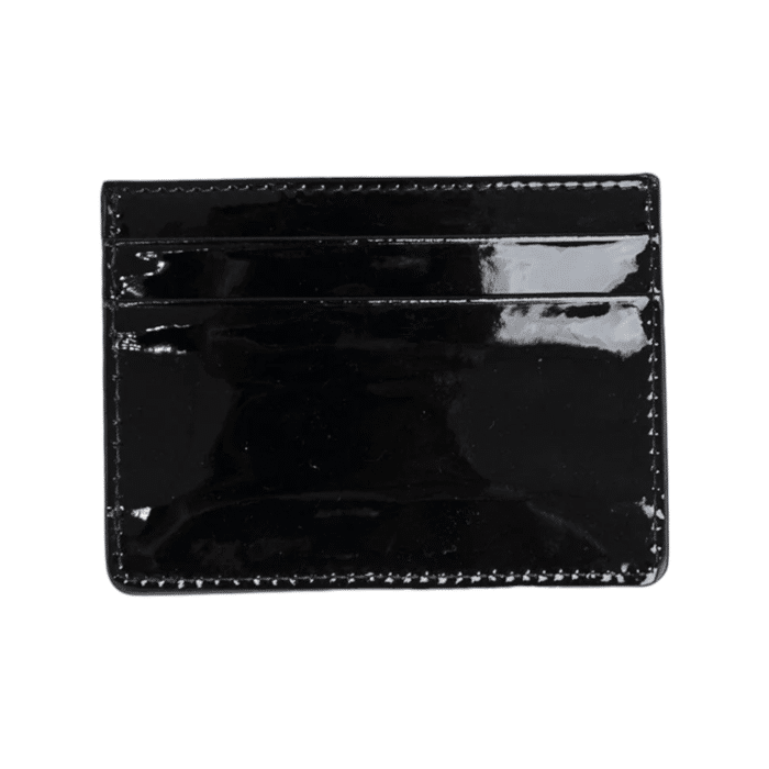 965 3A | The Vialli Valencia Card Holder in Black offers sleek sophistication with its premium leather construction and functional design. Perfect for organizing your cards and cash, it combines style and practicality effortlessly.