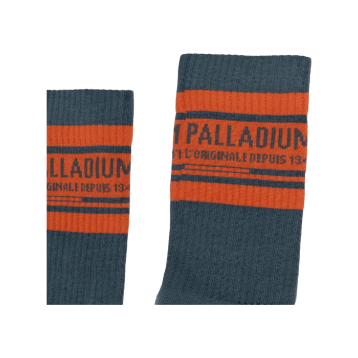 1031 4A | The Palladium Stripe Socks in Airforce with orange stripes combine classic style with modern comfort, perfect for any occasion. Made from a premium blend of materials, these socks ensure durability and a snug fit, providing both aesthetic appeal and practical benefits.