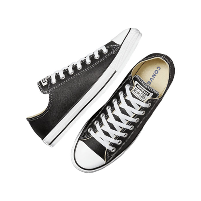 262 1B | The Converse Chuck Taylor Low Leather in Black brings a sophisticated twist to the iconic sneaker, offering a timeless look with a premium feel. Crafted from high-quality leather, these low-tops deliver both durability and classic style, making them a versatile addition to any wardrobe.