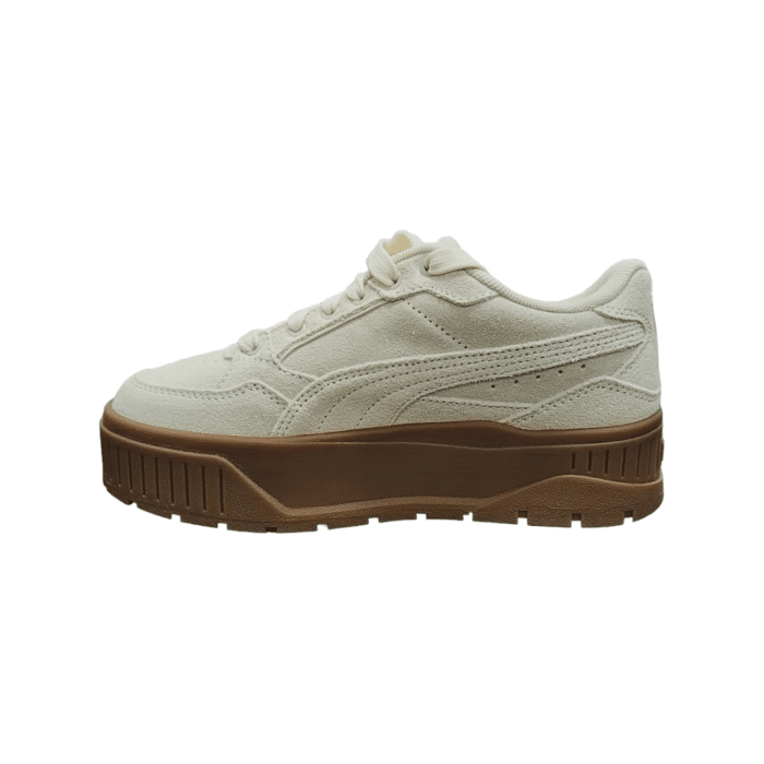 334 83A | The Puma Karmen II Idol SD in Frosted Ivory features a luxurious suede upper and a durable rubber sole, combining elegance and practicality. Designed for all-day comfort, these versatile sneakers seamlessly transition from casual outings to more polished occasions.