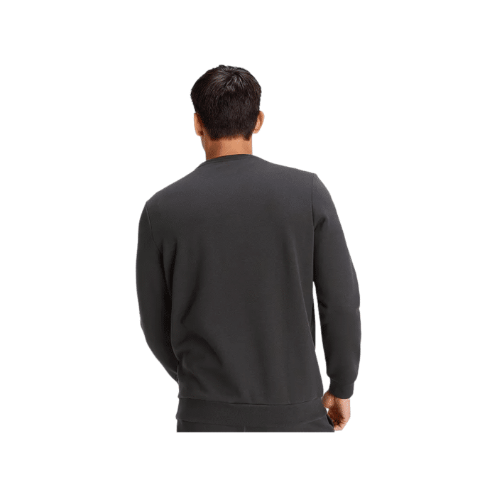 851 13C | The Puma Essential Logo Lab Sweater in Black offers the perfect blend of comfort and style, making it ideal for any occasion. Crafted from a soft, durable cotton-polyester blend, this sweater features the iconic Puma logo, ensuring you look effortlessly cool while staying cozy.