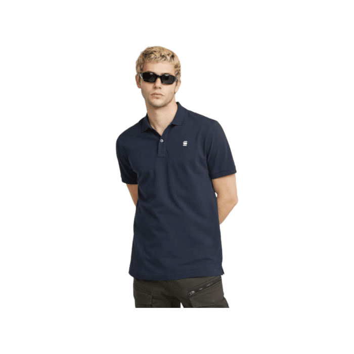 870 17A | The G Star Golfer Dunda Slim Polo S/S in Sartho Blue combines classic design with a modern slim fit, making it a versatile addition to any wardrobe. Crafted from high-quality materials, this polo ensures both comfort and style for any occasion.