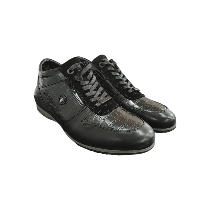 409 11B | Elevate your casual look with the Enrico Coveri Sneaker in Black, featuring a sleek design that effortlessly blends comfort and style. Crafted with premium materials, this sneaker provides durability and a modern aesthetic, making it perfect for everyday wear.