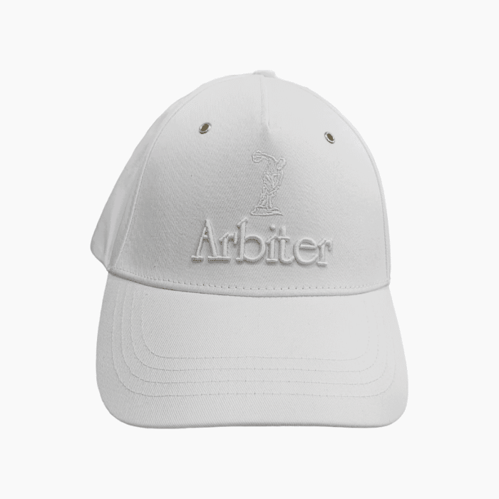 652 12A | The Arbiter Sports Peak Cap in Arbiter Cap Logo Core White offers a perfect blend of style and functionality, featuring durable, breathable fabric and an adjustable fit for all-day comfort. Its sleek color and structured design make it a versatile accessory, ideal for both athletic and casual wear.