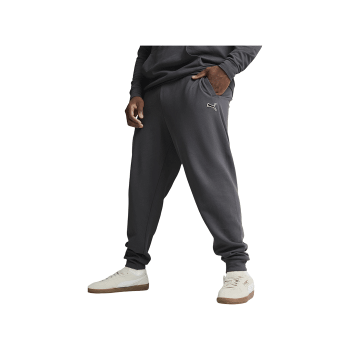 2919 15B | The Puma Better Essentials Sweatpants in Galactic Grey offer a perfect balance of comfort and style, crafted from 100% cotton for a soft, breathable feel. With a lining blend of 75% cotton and 25% polyester, they provide added warmth and durability, making them ideal for both lounging and light activities. Designed in a versatile grey shade, these sweatpants are a must-have for casual wear, combining modern aesthetics with functional design.