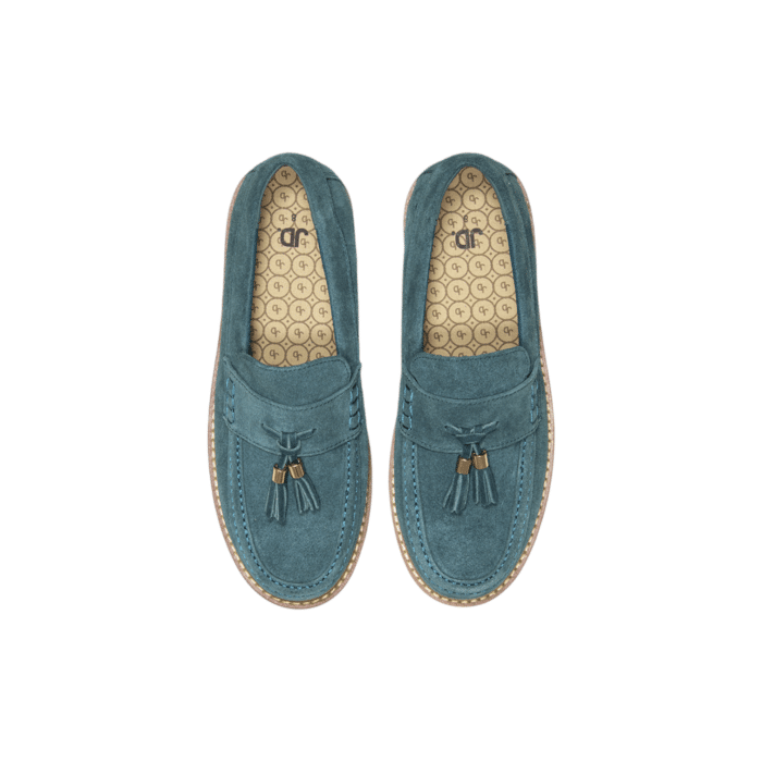 55 49A | The Jonathan D Scout Tassel Suede shoes in Teal color effortlessly combine sophistication and modern style, making them a versatile addition to any wardrobe. Crafted from high-quality Suede with a sleek tassel detail, these shoes offer a polished look that's perfect for both formal occasions and smart-casual outfits.