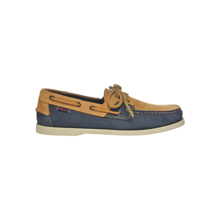 82 10 | The Sebago Rossisland in Navy Blue/Ocra offers a sleek blend of style and durability, perfect for both casual outings and rugged adventures. With its premium materials and refined color combination, this shoe ensures a comfortable fit while making a striking fashion statement.