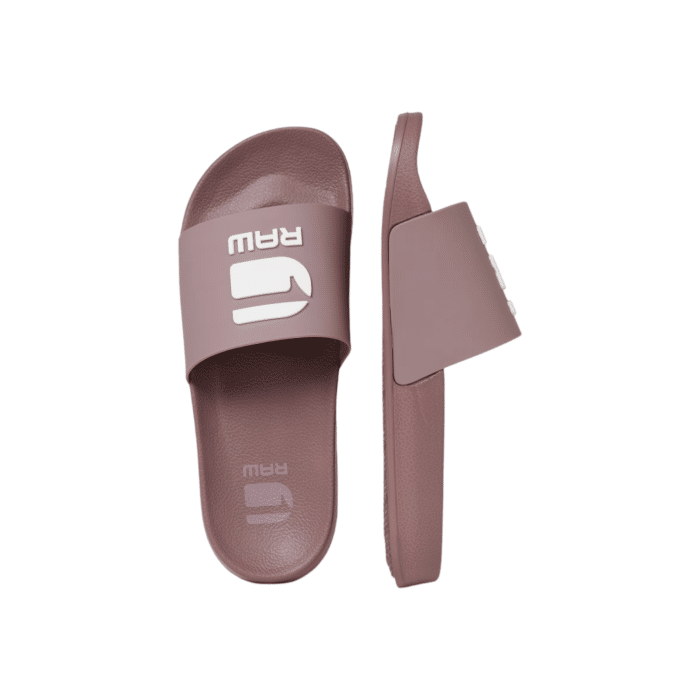 961 2B | Step into comfort and style with the G Star Cart III Basic Slides in a chic Mauve Pink, featuring crisp white detailing on the top. Designed from durable 100% Thermoplastic Polyurethane, these slides offer both flexibility and resilience for everyday wear. Please note, these slides are not washable, ensuring their unique design and material stay intact over time.