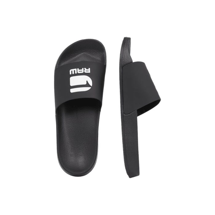 961 3B | Step into comfort and style with the G Star Ladies Cart III Basic Slides in a chic Black, featuring crisp white detailing on the top. Designed from durable 100% Thermoplastic Polyurethane, these slides offer both flexibility and resilience for everyday wear. Please note, these slides are not washable, ensuring their unique design and material stay intact over time.