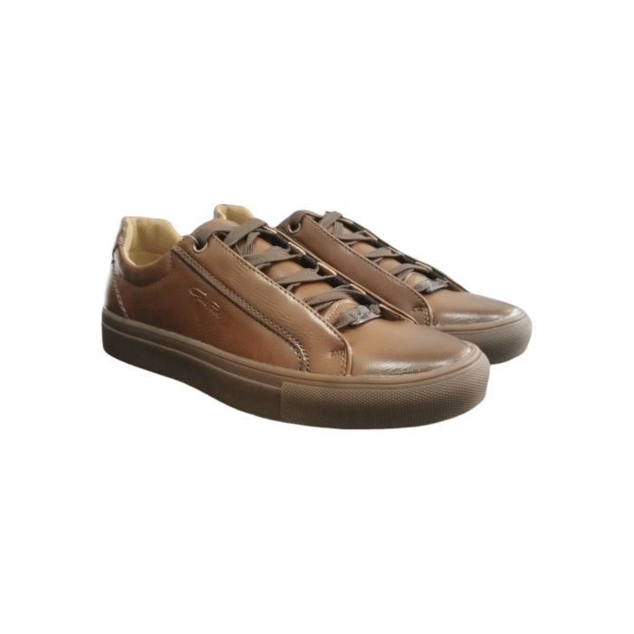 970 25B | Step into effortless style with the Gino Paoli Ben Sneaker in Dark Tan and Gum, crafted from durable synthetic material. These sneakers offer a sleek, contemporary design perfect for everyday wear, combining comfort and versatility to elevate your casual look.