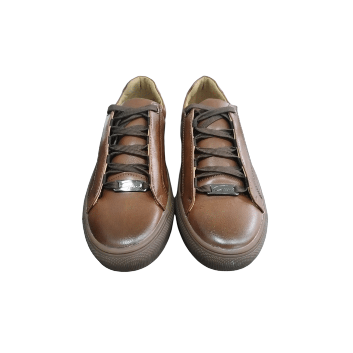 970 25C | Step into effortless style with the Gino Paoli Ben Sneaker in Dark Tan and Gum, crafted from durable synthetic material. These sneakers offer a sleek, contemporary design perfect for everyday wear, combining comfort and versatility to elevate your casual look.