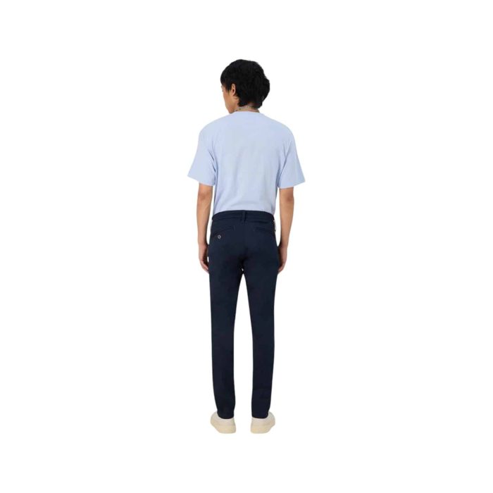 1089 2B | The G-Star Skinny Chino 3.0 in Salute Navy is a modern wardrobe essential that combines a sleek, skinny fit with a sophisticated, versatile color, making it perfect for both casual and semi-formal occasions. Crafted from a premium cotton blend with added stretch, these chinos provide exceptional comfort and freedom of movement while maintaining their shape and sharp silhouette throughout the day. With a classic five-pocket design and thoughtful detailing, including a secure zipper fly and subtle G-Star branding, these chinos effortlessly elevate your style, allowing for seamless transitions from day to night.