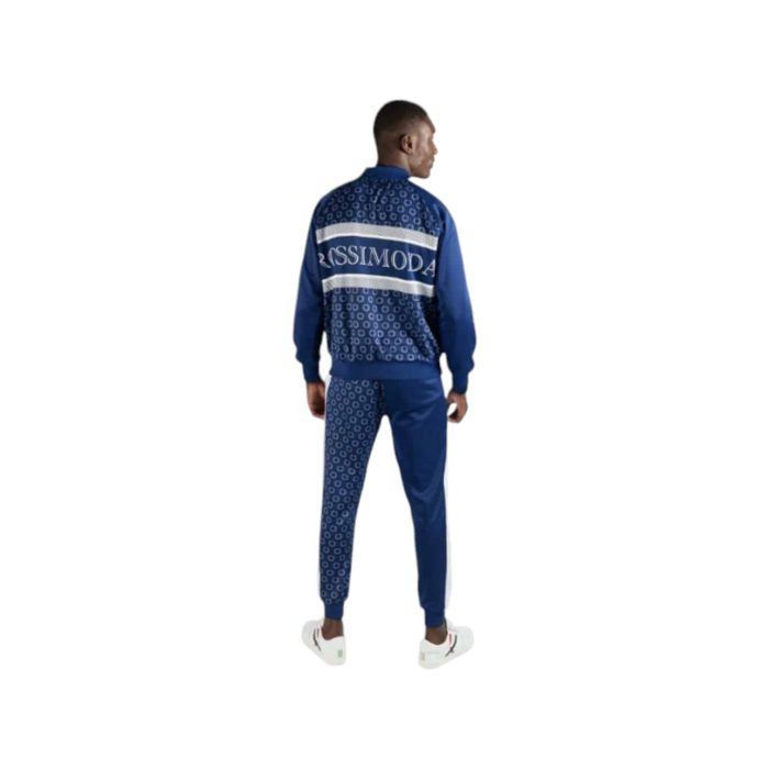 110 13B | The Rossimoda Tracksuit Ghirlanda Navy/White combines modern style with exceptional comfort, making it a versatile choice for any active lifestyle. Crafted from high-quality, breathable fabric, this tracksuit features a tailored fit that enhances your silhouette while allowing for easy movement, whether you’re hitting the gym or enjoying a casual day out. The striking navy color paired with crisp white accents not only adds a sporty flair but also ensures that you look effortlessly stylish in any setting, whether you're running errands or relaxing at home.