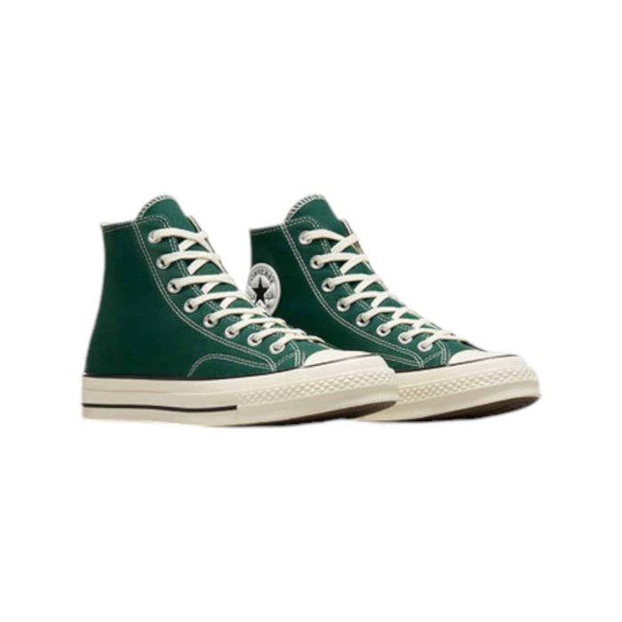 130 110C | The Converse Chuck 70 Hi Green/Black blends vintage charm with modern updates, featuring a bold green canvas upper contrasted by sleek black accents for a standout look. Crafted from premium materials, it offers enhanced comfort with a cushioned OrthoLite insole and a thicker rubber sole for better support and durability. This high-top sneaker not only makes a style statement but also provides superior performance, making it perfect for everyday wear and versatile enough to pair with any outfit.