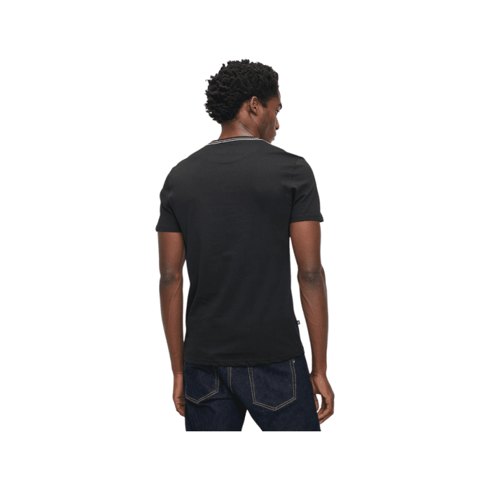 303 122AA | The Polo Crew Type Printed T-Shirt in Black offers a blend of casual sophistication and timeless style. Featuring a classic crew neckline and a bold logo print, this shirt is designed to provide all-day comfort while making a statement, perfect for effortless everyday wear.