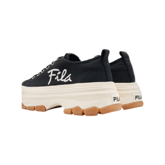 460 20C | The Fila Reese in Black and Gum is a chic and versatile ladies' shoe that combines classic design with modern comfort. Its neutral tones effortlessly complement any casual or sporty outfit, while the cushioned sole ensures all-day support and ease with every step.