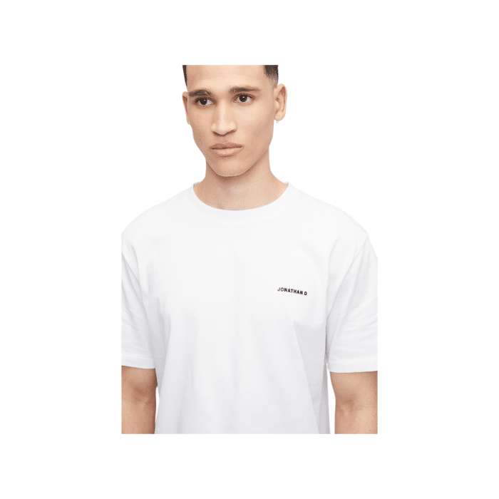 47 12C | The Jonathan D T-Shirt Celer in White offers a sleek, minimalist design crafted from soft, breathable cotton, providing both comfort and durability for everyday wear. Its versatile White hue and classic fit make it a perfect choice for effortless style, whether dressed up or down.