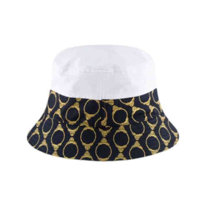 479 40A | The Rossimoda Floppy Lorenzo Hat in White, Black, and Gold is a stunning accessory that seamlessly blends contemporary elegance with playful sophistication, making it a must-have for any fashion-forward wardrobe. With its eye-catching color combination, featuring a crisp white base adorned with striking black accents and luxurious gold detailing, this hat effortlessly elevates any outfit, whether you're dressing up for a garden party or enjoying a casual day at the beach. The wide, floppy brim not only provides excellent sun protection but also adds a relaxed, flowing silhouette, ensuring you look chic and feel comfortable during all your summer adventures.