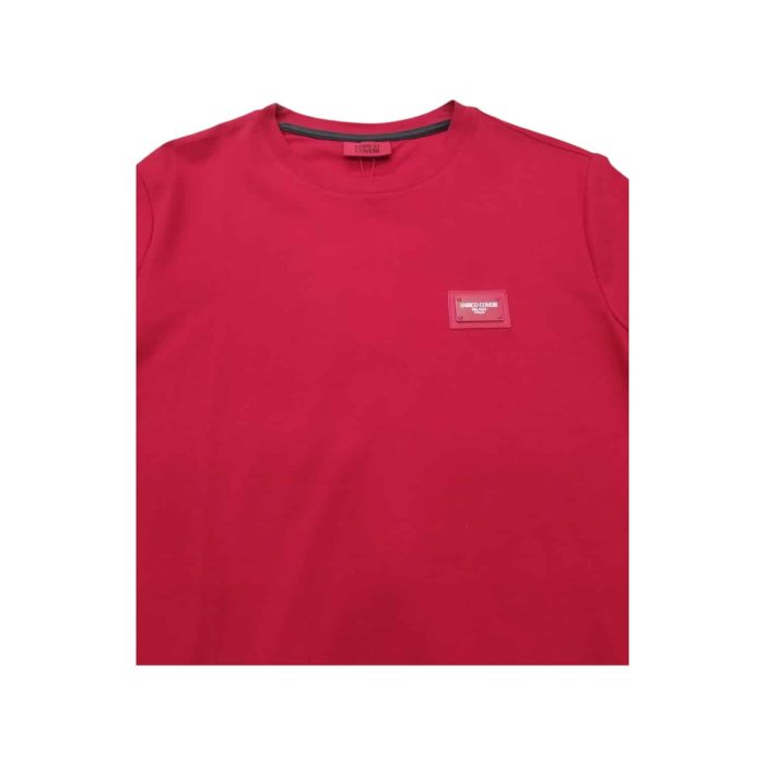 559 105 C | The Enrico Coveri T-Shirt Small Chest Logo in Red is a vibrant and eye-catching piece that effortlessly elevates your casual wardrobe, showcasing a bold red hue that exudes energy and confidence. Crafted from premium-quality cotton, this t-shirt not only offers a luxuriously soft and breathable fit for all-day comfort but also features a small chest logo that adds a touch of sophistication without compromising the minimalist aesthetic. With its classic crew neck and relaxed silhouette, this versatile t-shirt is perfect for pairing with jeans, shorts, or chinos, making it an essential staple that enhances your style while ensuring you feel comfortable and confident in any setting.