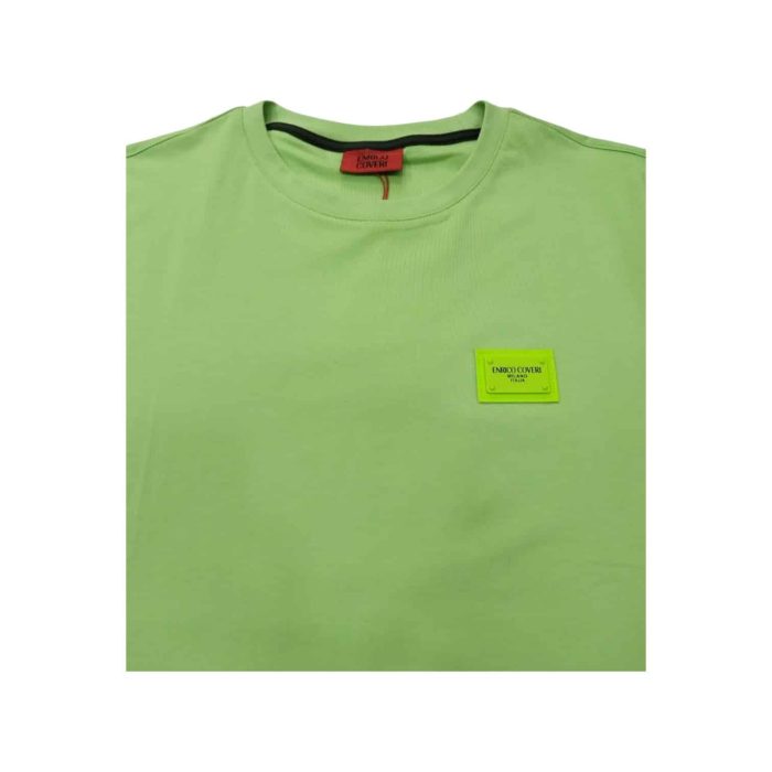 559 107 C | The Enrico Coveri T-Shirt Small Chest Logo in Lime Green is a bold and energetic piece that instantly elevates your casual wardrobe, featuring a striking lime green hue that adds a vibrant touch to any outfit. Made from high-quality cotton, this t-shirt promises exceptional comfort and breathability, making it ideal for all-day wear whether you're out with friends or enjoying a leisurely day at home. The subtle small chest logo adds a hint of sophistication without overwhelming the design, allowing for effortless styling that pairs beautifully with jeans, shorts, or chinos for a versatile look that showcases your unique sense of fashion.