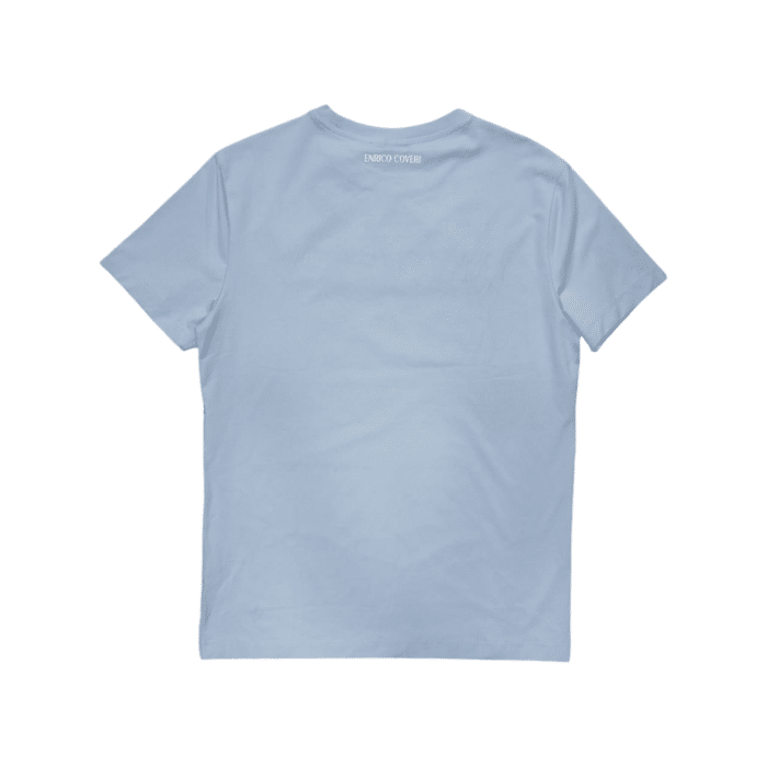 559 124A | The Enrico Coveri 3D stitch T-Shirt in Light Blue with striking White  and Black Detailing is the perfect blend of style and comfort, featuring a minimalist design that showcases a bold black and white logo stitched across the chest for an eye-catching contrast. Made from high-quality, breathable fabric, this t-shirt ensures all-day comfort while maintaining a flattering fit, making it an ideal choice for casual outings or relaxed gatherings. With its classic crew neck and versatile color scheme, this t-shirt pairs effortlessly with jeans, shorts, or chinos, allowing you to create a variety of stylish looks with ease.