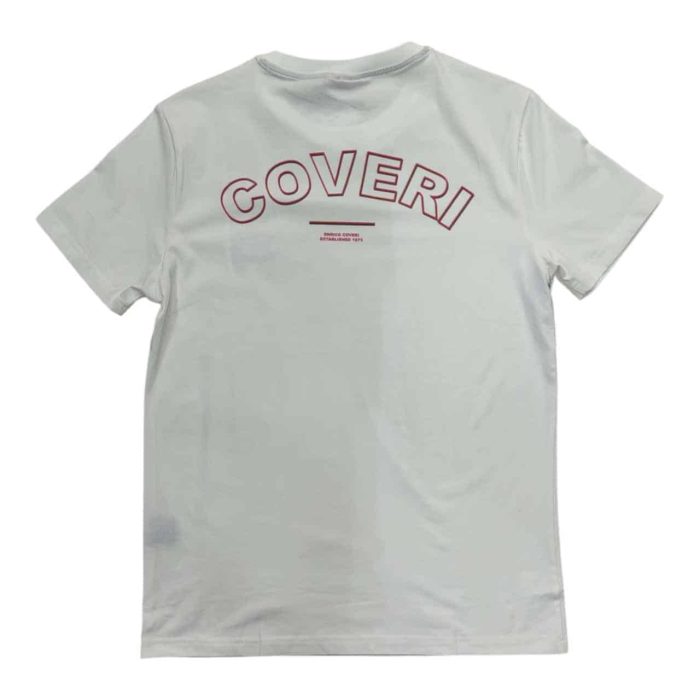 559 154 B rotated | The Enrico Coveri Mini Metal Logo T-Shirt in White blends minimalist sophistication with premium comfort, crafted from high-quality cotton for a soft, breathable feel that suits any occasion. Featuring a discreet mini metal logo on the chest, this T-shirt adds a subtle touch of elegance to a versatile, clean white design, making it easy to pair with both casual and smart-casual outfits. Designed with a modern slim fit, it flatters the body while allowing unrestricted movement, embodying Enrico Coveri’s dedication to timeless style and quality craftsmanship.