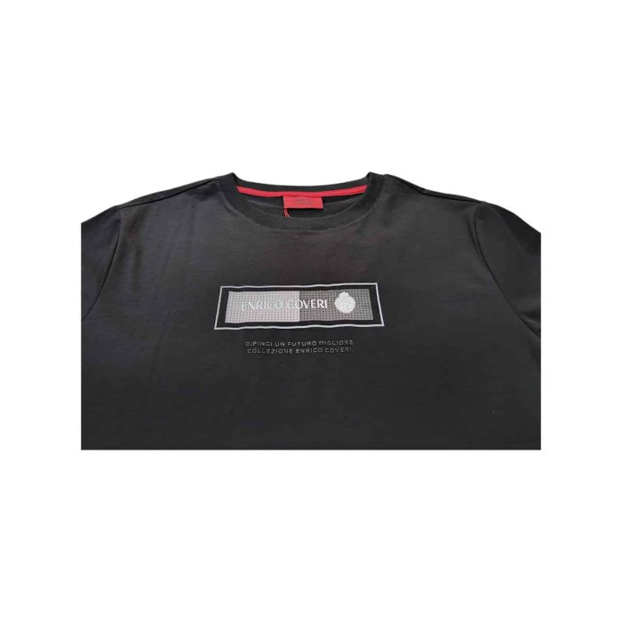 559 160 C | The <em>Enrico Coveri T-Shirt Graphic Dot Print Black</em> effortlessly combines modern style with comfort, showcasing a bold dot print that stands out against the sleek black fabric, making it a statement piece for any casual outfit. Crafted from high-quality, breathable material, this t-shirt ensures all-day comfort while maintaining its shape and vibrant design even after multiple washes, allowing for long-lasting wear. With its classic crew neckline and relaxed fit, this versatile t-shirt can be easily paired with jeans for a laid-back look or dressed up with chinos for a more polished ensemble, making it perfect for a variety of occasions.