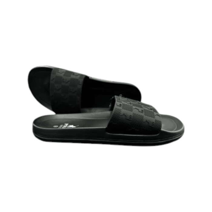 664 1B | The Polo Polo Block Monogram Pool Sandal in Black offers a sleek, minimalist design perfect for laid-back summer days by the pool or casual strolls. Featuring a cushioned footbed for enhanced comfort and a durable rubber outsole for superior traction, these slides are both stylish and practical. With its bold black base and contrasting monogram detailing, this versatile slide combines effortless sophistication with water-resistant functionality for any warm-weather occasion.