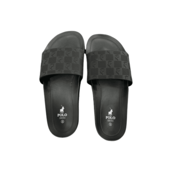 664 1C | The Polo Polo Block Monogram Pool Sandal in Black offers a sleek, minimalist design perfect for laid-back summer days by the pool or casual strolls. Featuring a cushioned footbed for enhanced comfort and a durable rubber outsole for superior traction, these slides are both stylish and practical. With its bold black base and contrasting monogram detailing, this versatile slide combines effortless sophistication with water-resistant functionality for any warm-weather occasion.