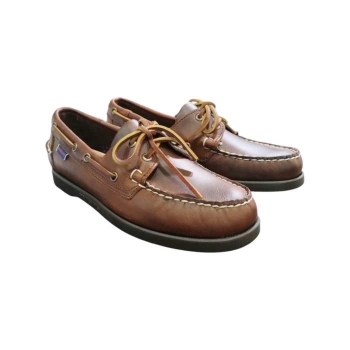 82 4B | The Sebago Docksides Portland in Brown/Gum offers a sleek blend of style and durability, perfect for both casual outings and rugged adventures. With its premium materials and refined color combination, this shoe ensures a comfortable fit while making a striking fashion statement.