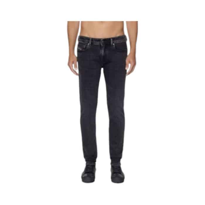 866 6 B | The <em>Diesel Jeans Skinny 1979 Sleenker Washed Black</em> offers a modern, body-hugging fit that tapers from the hips to the ankles, creating a sleek silhouette that is both flattering and versatile for various outfits. Crafted from premium stretch denim, these jeans provide all-day comfort and ease of movement, while the washed black finish gives them a subtly distressed, worn-in look, adding an edgy yet refined touch to your wardrobe. Thoughtfully designed with details such as reinforced stitching, branded metal hardware, and Diesel’s iconic logo patch on the back waistband, these jeans combine style, durability, and practicality for any occasion.