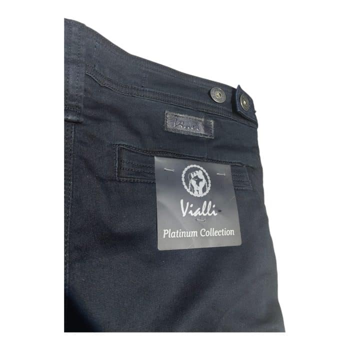 939 23 B | The Vialli Jeans Kosmos Ink Morbido in Dark Navy offers a sleek and versatile option for any wardrobe, crafted from a premium cotton-elastane blend that provides a comfortable, flexible fit. With its slim silhouette and mid-rise design, these jeans effortlessly balance style and comfort, making them ideal for both casual and dressier occasions. The rich dark navy color adds sophistication, while the durable fabric ensures long-lasting wear, maintaining its shape and color through every wash.