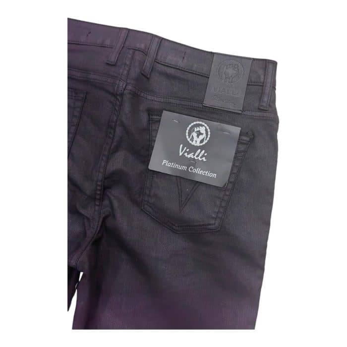 939 5 D | Vialli Jeans Blade Ultra Wax Black, where sophisticated design meets unparalleled comfort; crafted from premium, durable fabric with a unique waxed finish, these jeans offer a sleek look that effortlessly transitions from casual outings to polished events. Featuring a tailored fit that flatters all body types, the mid-rise waistband ensures a comfortable yet stylish silhouette, while the multiple pockets provide practical storage for your essentials without compromising on aesthetics. Committed to sustainability, Vialli incorporates eco-friendly production methods, making the Blade Ultra Wax Black not just a fashionable choice but a responsible investment in both style and the environment.