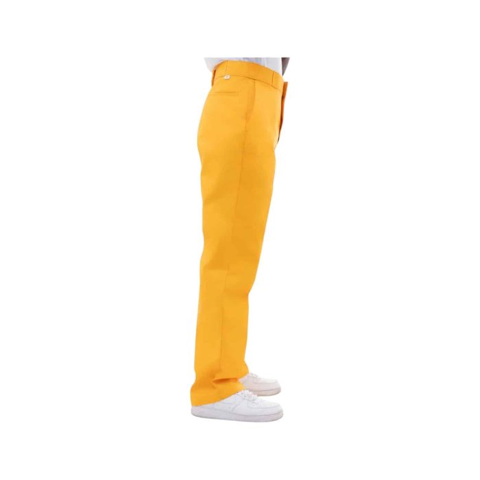 Dickies Gold T B | The Dickies 847 Trousers in Gold are expertly crafted from a durable blend of cotton and polyester, offering both comfort and resilience for everyday wear. Designed with a classic fit, these trousers feature multiple pockets for practicality, ensuring you have ample storage for your essentials while maintaining a polished appearance suitable for various occasions. The striking gold color adds a unique flair to your wardrobe, allowing for versatile styling options that transition seamlessly from work to casual outings without compromising on style or functionality.