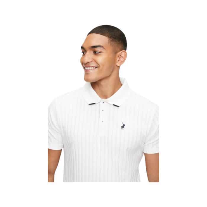 302 75 C | The Polo SS Textured Golfer in Off White offers a perfect blend of comfort, style, and versatility, crafted from a high-quality, breathable cotton blend that ensures all-day wearability. Its textured fabric adds a sophisticated touch to the classic polo design, while the off-white color provides a clean, modern look that can easily be paired with a variety of bottoms. The tailored fit, combined with a classic polo collar and short sleeves, makes this shirt a timeless addition to any wardrobe, ideal for both casual outings and more polished, smart-casual occasions.