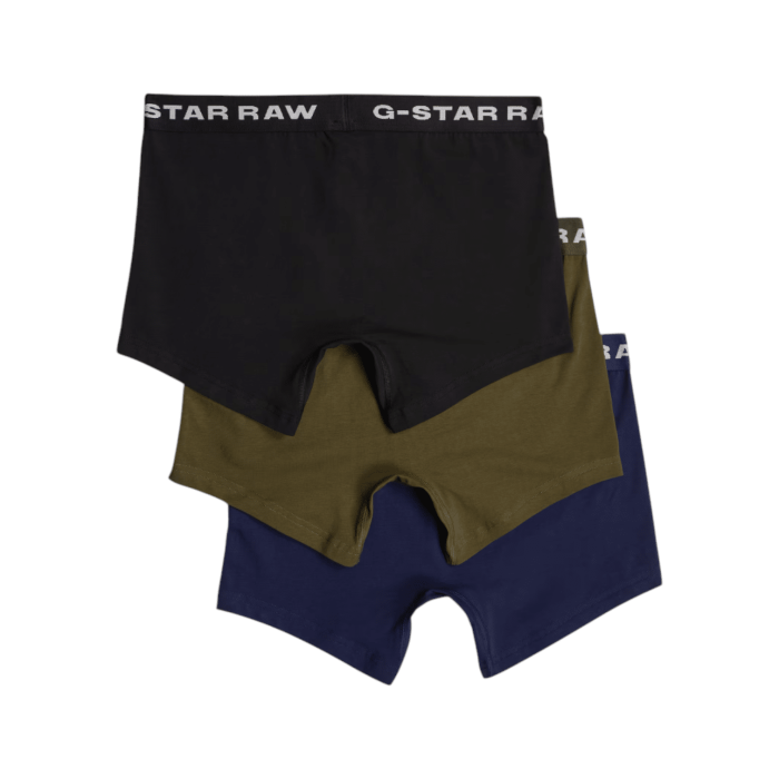 596 4A | The G-Star Boxer Briefs 3-Pk in Green, Blue and Black offer a snug fit that ensures all-day comfort, featuring a sewn-in pouch for added support and short legs that stay in place without riding up. Made from a blend of 95% organic cotton and 5% elastane, these boxer briefs provide a super stretch for optimal flexibility and shape retention, while the jersey knit fabric feels soft to the touch and is breathable for maximum comfort. With the signature G-Star RAW elastic waistband, this set of three delivers reliable support, combining style, comfort, and sustainability in every pair.