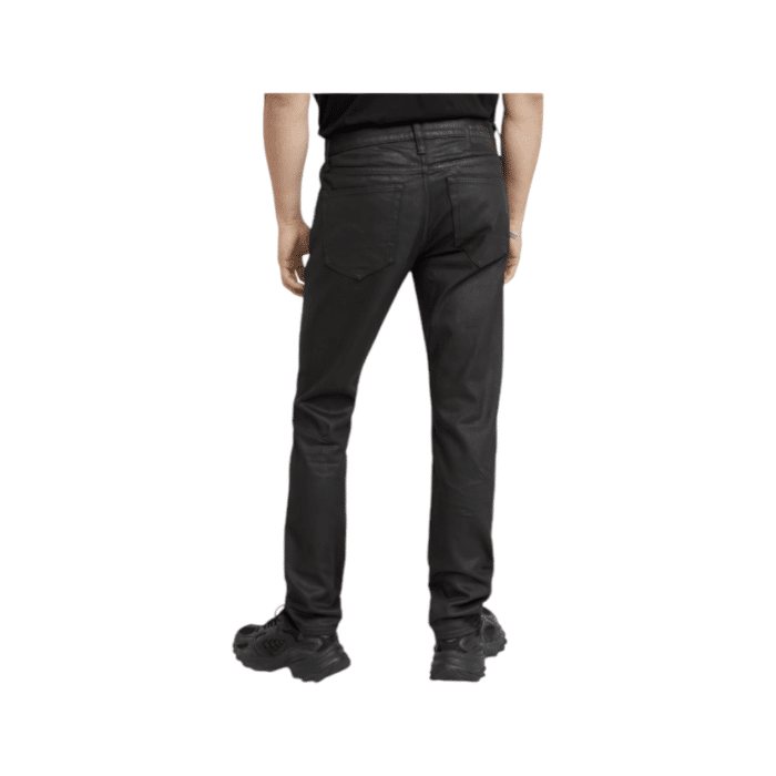 808 29B | The G Star Jeans 3301 Slim Fit in Dark Aged Wax Black Colour offers a classic denim look with a modern slim fit, perfect for any occasion. Its high-quality fabric and expert craftsmanship ensure durability and comfort, making these jeans a versatile and stylish addition to your wardrobe.