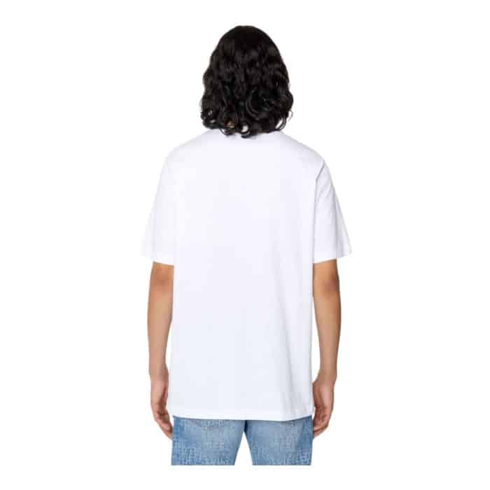 862 39 C | The Diesel T-Shirt T-Just E43 White combines bold graphic design with timeless versatility, making it a standout addition to any wardrobe. Crafted from 100% premium cotton, this T-shirt offers a lightweight, breathable feel and a regular fit for all-day comfort and effortless style. Featuring a striking front graphic against a crisp white backdrop, it transitions seamlessly from casual outings to trendy layered looks, embodying Diesel’s signature modern edge.