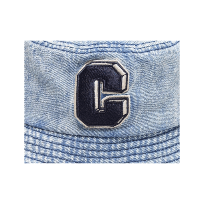 12 10B | Elevate your style with the Cutty Floppy Oasis Bucket Hat in blue denim, featuring a bold embroidered "C" and a classic washed design for a retro-inspired yet modern look. Crafted from durable and breathable fabric, this versatile hat combines comfort and functionality, making it perfect for sunny days, casual outings, or festival-ready outfits.