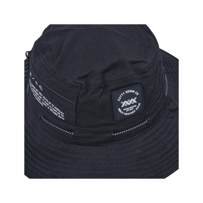 12 12C | Elevate your style with the Cutty Bucket Hat Aurora in sleek black, a perfect blend of timeless design and modern functionality. Featuring a lightweight, durable construction with a wide brim for sun protection, this versatile hat is ideal for casual outings, festivals, and everyday adventures.