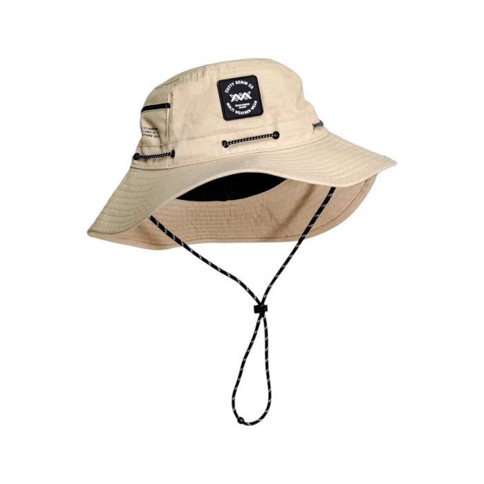 12 13B | Elevate your style with the Cutty Bucket Hat Aurora in sleek Stone, a perfect blend of timeless design and modern functionality. Featuring a lightweight, durable construction with a wide brim for sun protection, this versatile hat is ideal for casual outings, festivals, and everyday adventures.