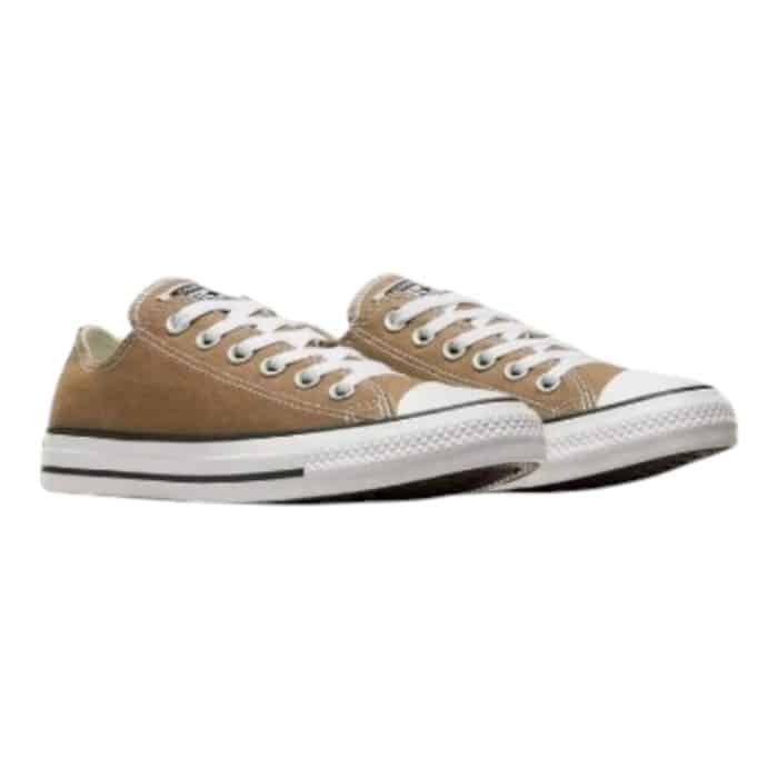 126 54 B | The Converse CTAS OX Desert Dust combines timeless design with a modern, earthy twist, featuring a muted beige canvas upper that effortlessly complements any outfit. Its durable construction, including a vulcanized rubber outsole and reinforced stitching, ensures lasting comfort and reliability for daily wear. Subtle branding and the iconic rubber toe cap complete the look, making this low-top sneaker a versatile and stylish choice for any occasion.