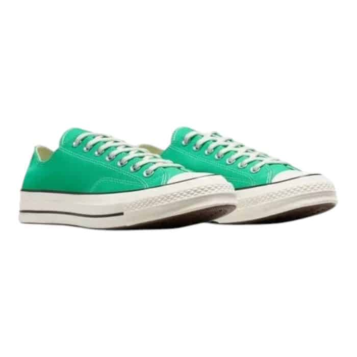 126 75 B | The Converse Chuck 70 Low in Prism Green/Egret/Black combines vintage-inspired design with modern craftsmanship, offering a bold yet versatile aesthetic. Its premium 12-ounce canvas upper, high-gloss rubber sidewall, and OrthoLite® insole ensure durability, comfort, and all-day support. Perfect for making a statement or complementing casual outfits, this timeless sneaker reimagines the classic Chuck Taylor for today’s style-savvy wearer.