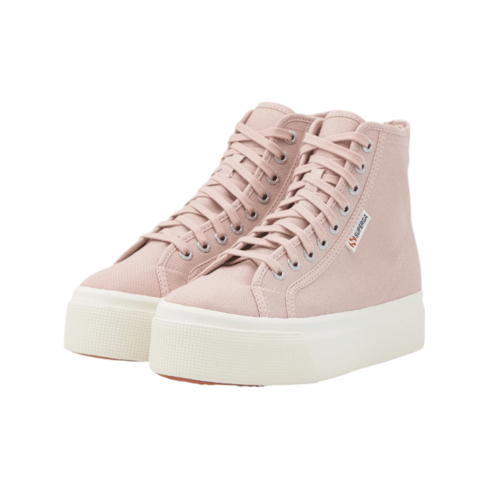 556 24A | The Superga 2708 Hi Top in pink features a breathable cotton canvas upper and comfortable cotton lining for all-day wear. With a platform heel, lace-up fastening, and durable synthetic sole, these sneakers offer a stylish and practical addition to your wardrobe.